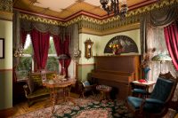 Antique Piano in Victorian parlor