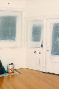 Refinishing floors in the studio